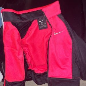Pink Nike jacket size 12M.
